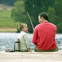 a father and a son fishing
