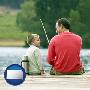 a father and a son fishing - with South Dakota icon