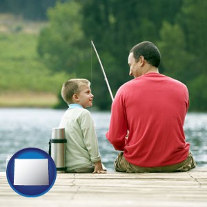 a father and a son fishing - with Wyoming icon